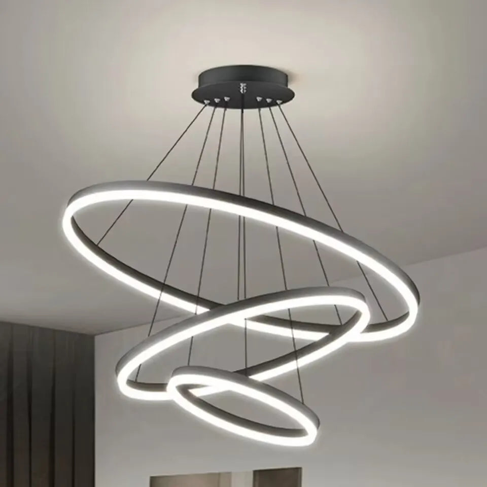 Modern LED pendant lights suitable for bedrooms, living rooms, and dining rooms. Circular ceiling chandelier, home lighting.
