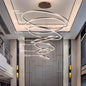 Modern LED pendant lights suitable for bedrooms, living rooms, and dining rooms. Circular ceiling chandelier, home lighting.